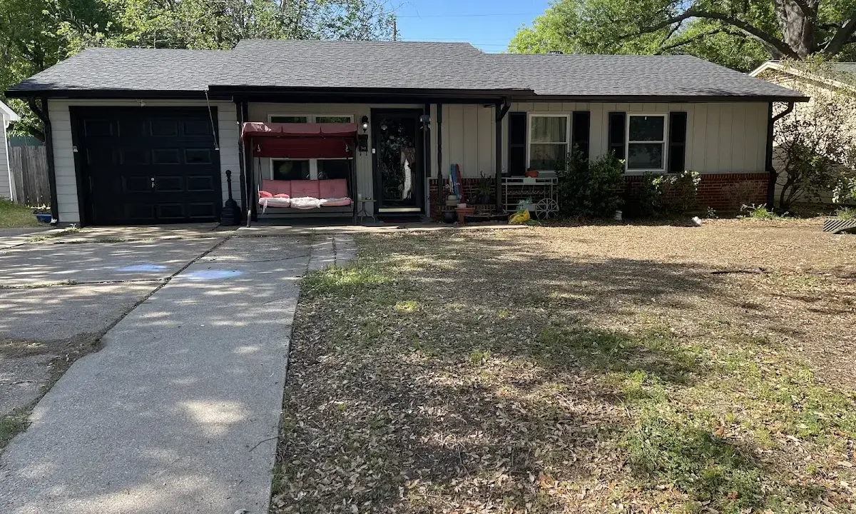 Asphalt Shingle Roof Repair crew at work on a residential roof in Live Oak